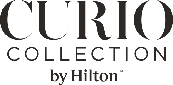 Logo for The Exchange Sacramento, Curio Collection by Hilton