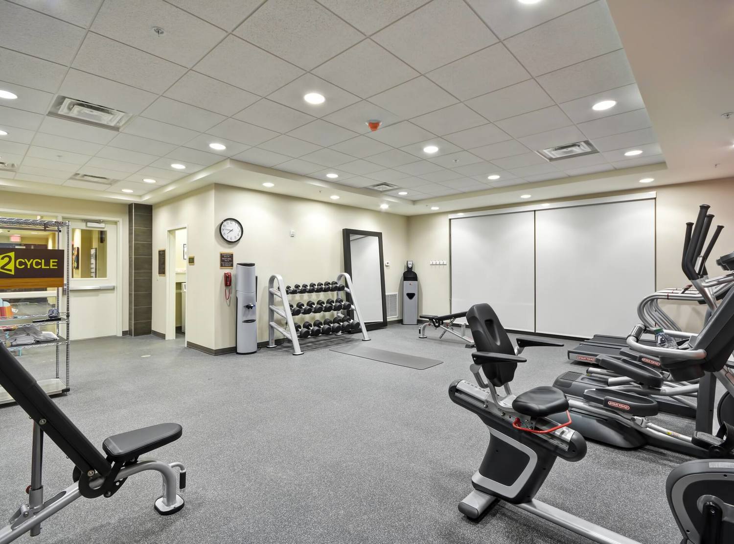 Fitness Center with Cardio Equipment, Weight Rack and Weight Bench
