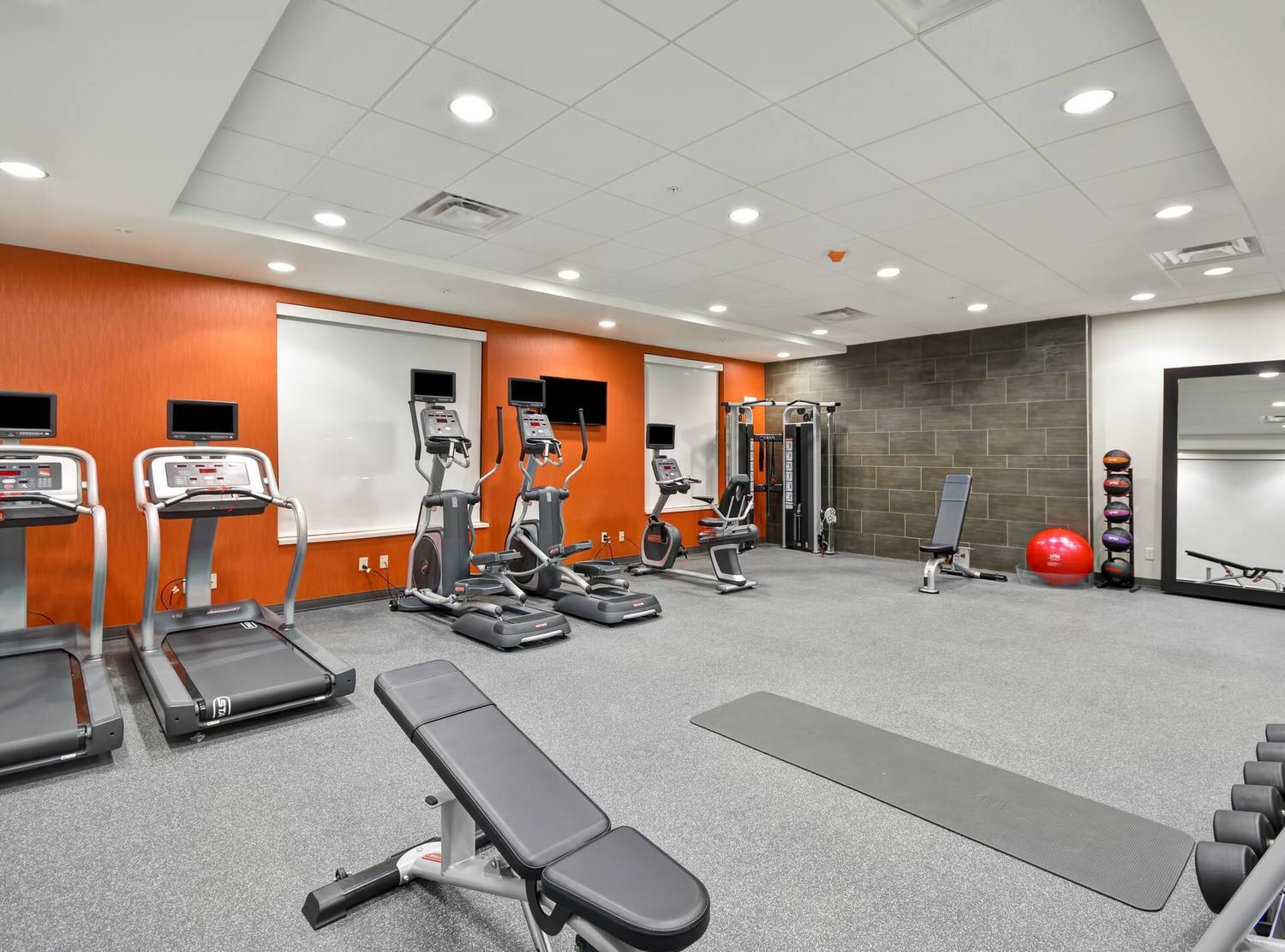 Fitness Center with Treadmills, Weight Bench, Cross-Trainers and Cycle Machine